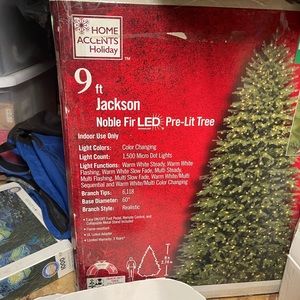 9ft prelit Christmas tree. Cable had damage it was repaired works like new